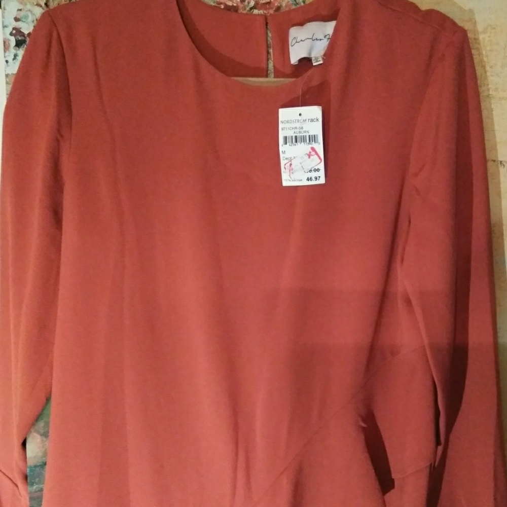 Dress with asymmetrical ruffles